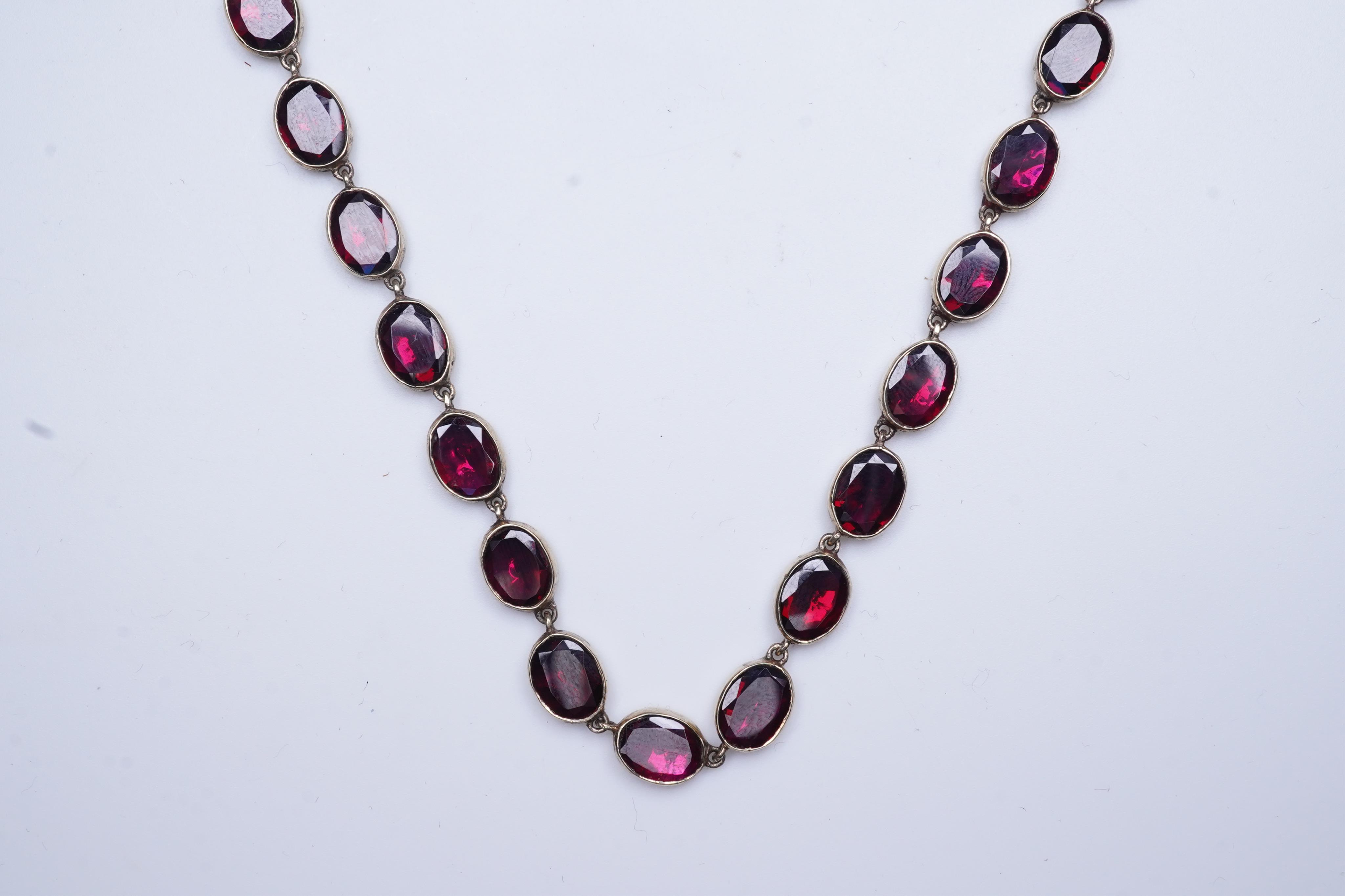 A garnet rivière necklace, circa 1970